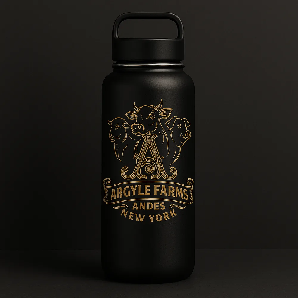 Black 32oz insulated stainless bottle with laser-etched crest
